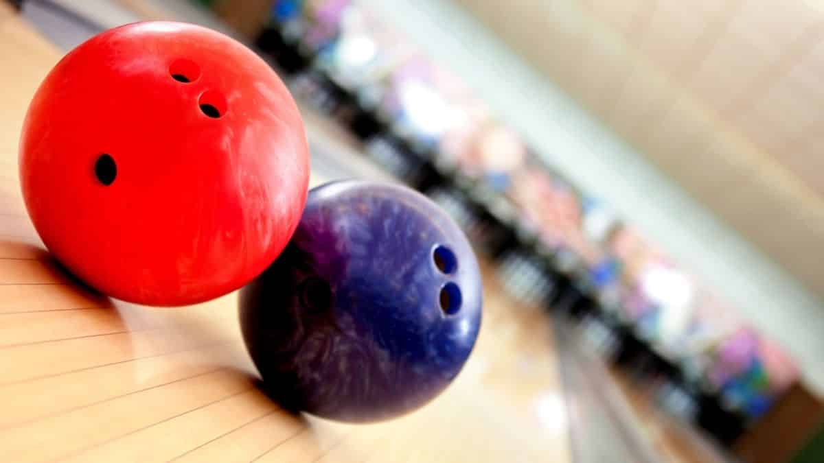 close up shot of colorful bowling balls in an alley